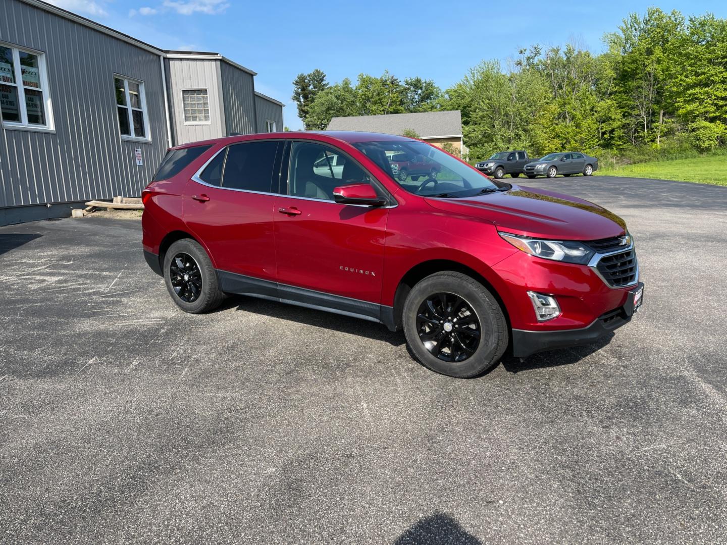 2018 Red /Black Chevrolet Equinox LT AWD (2GNAXSEV2J6) with an 1.5L I4 DOHC 16V TURBO engine, 6-Speed Automatic transmission, located at 11115 Chardon Rd. , Chardon, OH, 44024, (440) 214-9705, 41.580246, -81.241943 - This 2018 Chevrolet Equinox LT AWD with a 1.5L EcoTec Turbocharged engine and 6-speed automatic transmission offers a balanced blend of performance and fuel efficiency with a 30 MPG highway rating. This compact SUV is well-equipped for safety and convenience, featuring blind spot monitoring, rear cr - Photo#3